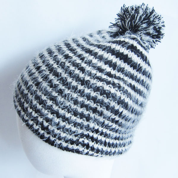 feather yarn hat with pompom