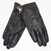 glove with pink pipping and button